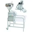 TAGLIAVERDURE E TAGLIAMOZZARELLA CON SUPPORTO - Mod. CL 55 2 TRAMOGGE TRIF - 2 tramogge: 1 tramoggia libera + 1 tramoggia a leva - Capacità coperti da 100 a 1000 - 2 velocità - Potenza W 1100 - Dimensioni cm L 86,5 x P 39,6 x 127,2h
