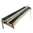 GRIGLIA A CARBONE PER ARROSTICINI A DOPPIA CANALINA TECNOROAST - SERIE TRD - STRUTTURA IN ACCIAIO INOX - SISTEMA DI ROTAZIONE AUTOMATICA - COTTURA OMOGENEA